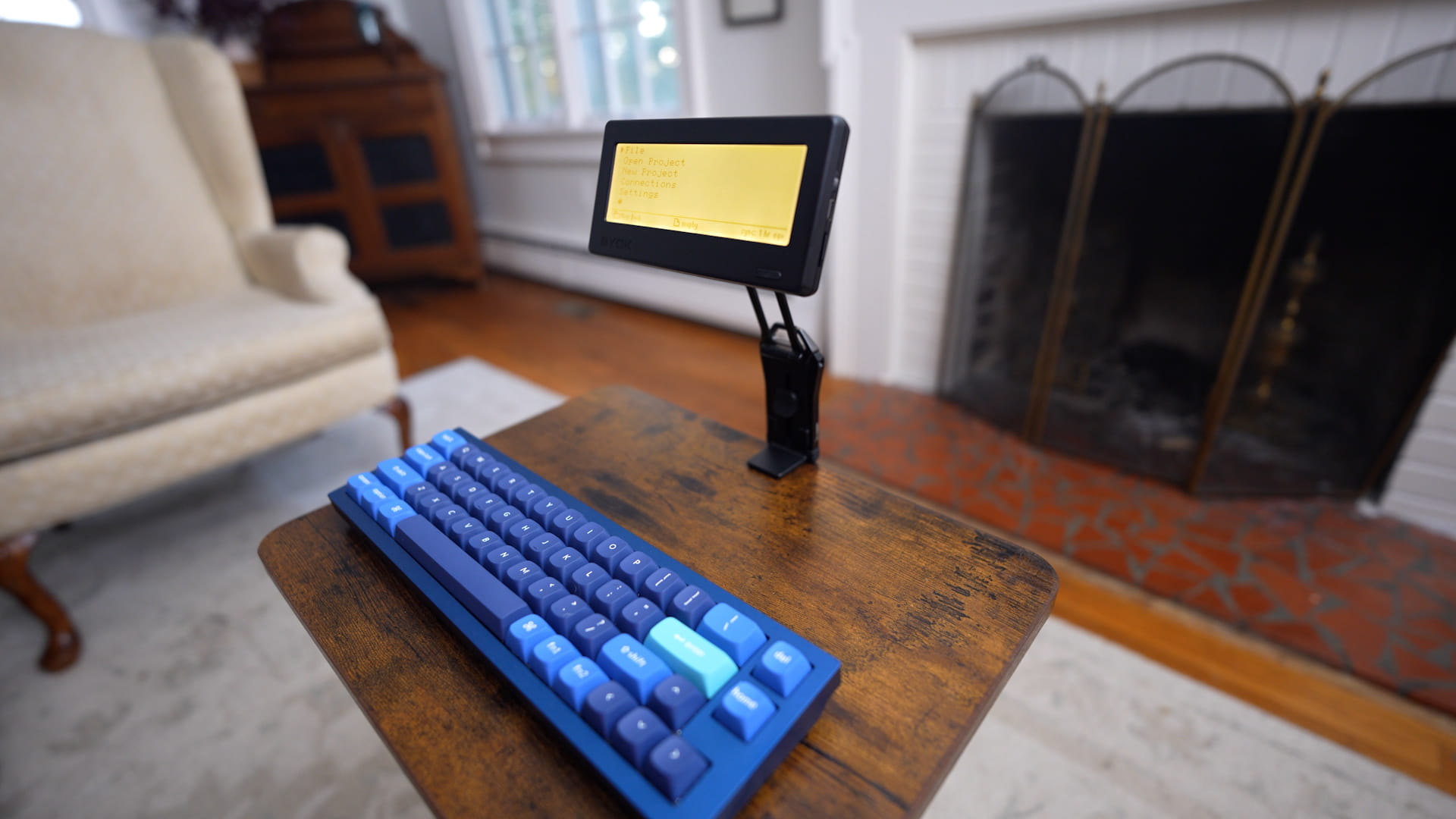 BYOK mounted on the adjustable magnetic arm of a clamp-and-tripod stand