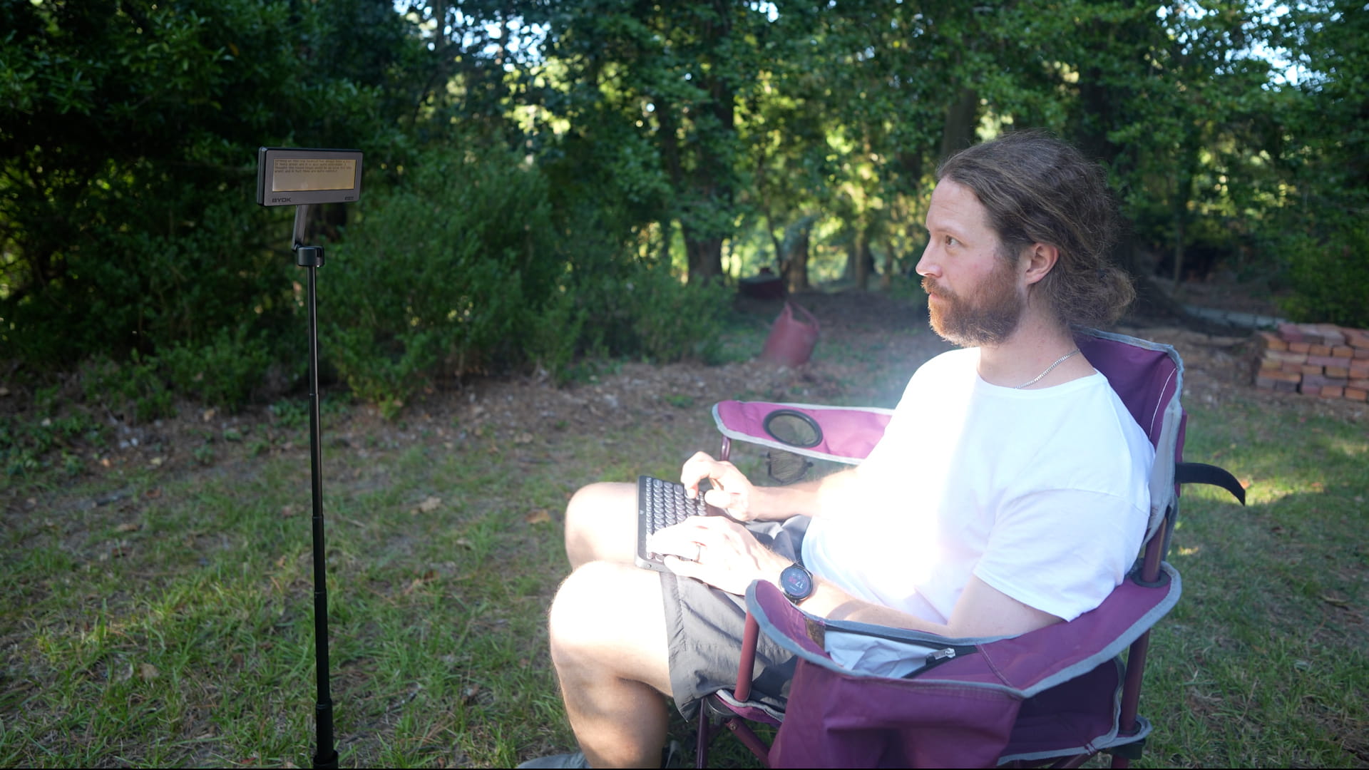 BYOK raised to eye level on a tall magnetic tripod outdoors