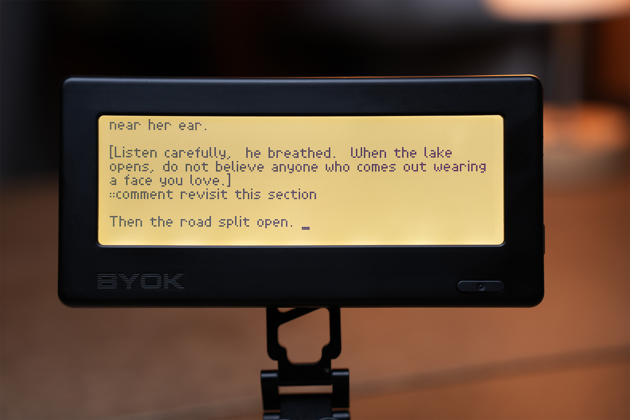 Close-up of the BYOK screen with a note written using the comment command at the end of a paragraph